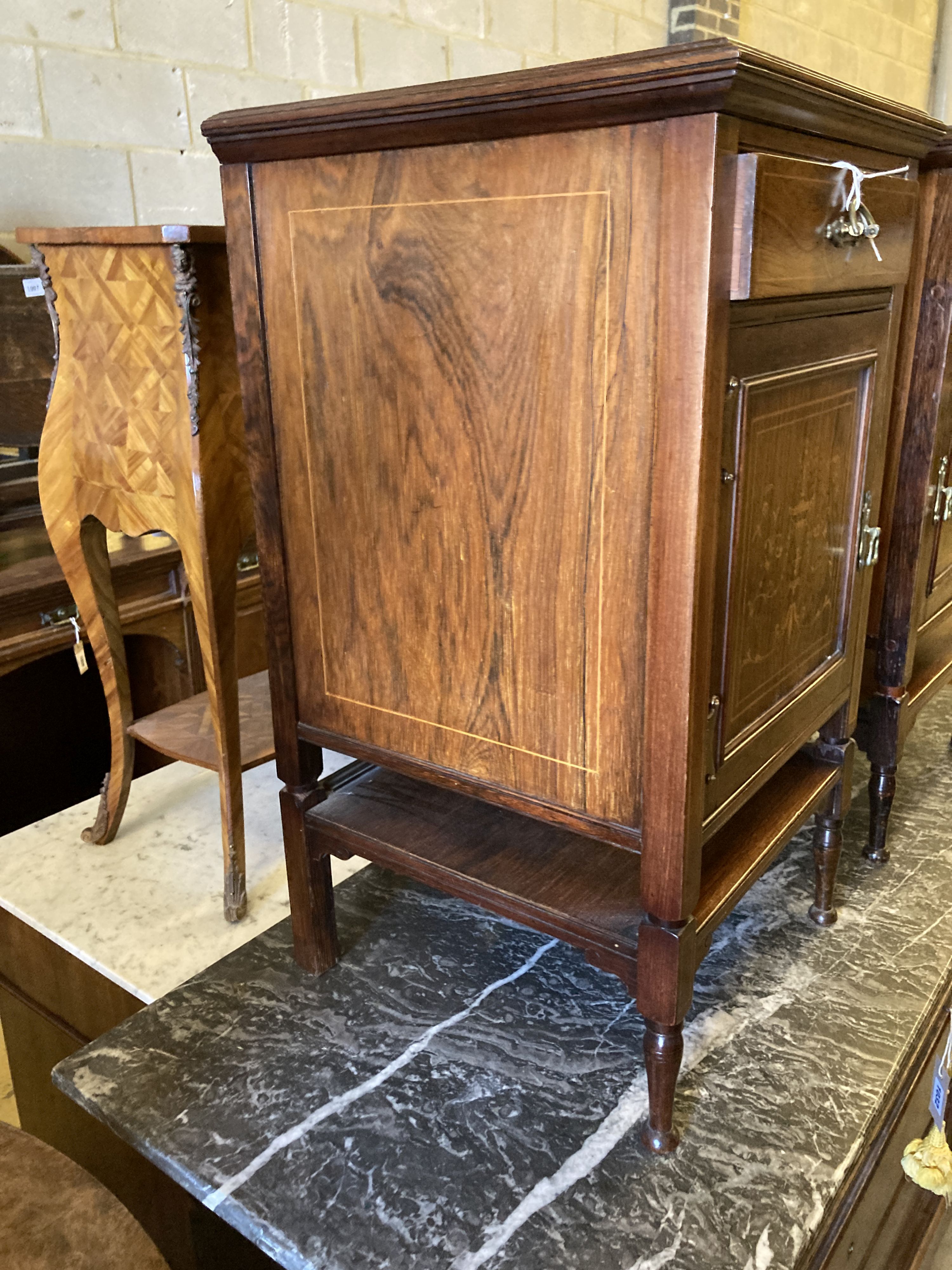 A pair of Edwardian marquetry inlaid rosewood bedside cupboards, width 39cm, depth 38cm, height 69cm